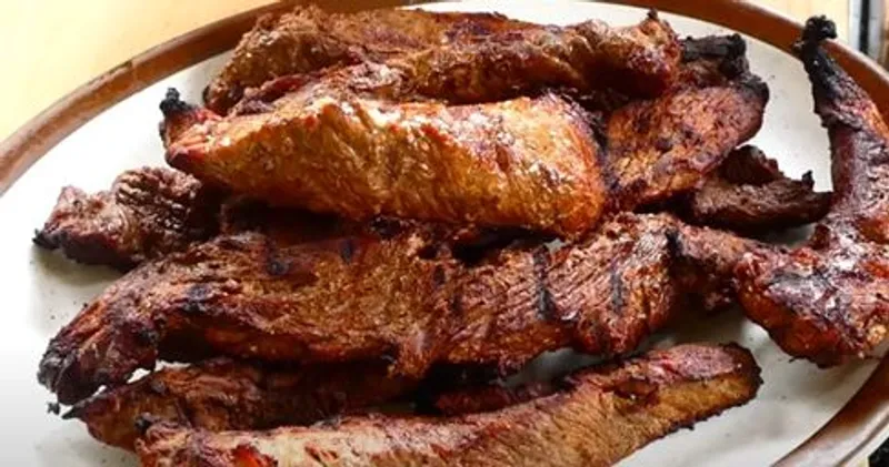 Cerdo carne asada