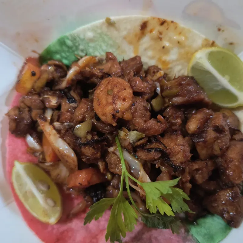 1 Taco de cerdo agridulce + Jugo Natural 